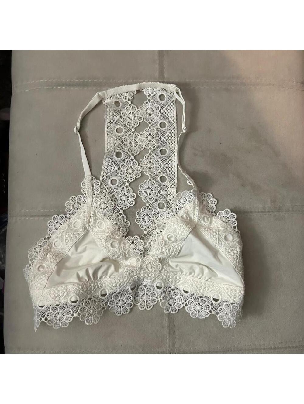 Aerie white lace bralette with floral and circular motifs, size XS